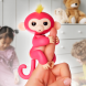 Интерактивная игрушка для детей ручная обезьянка Fingerlings розовый