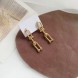 Жіночі сережки-підвіски "Тіффані" золотий колір 228