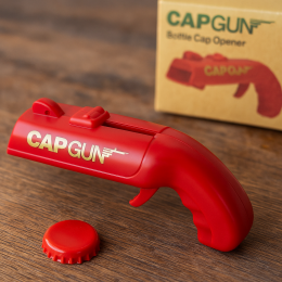 Відкривачка-пістолет, що стріляє кришками для пляшок, з контейнером під кришки Cap Gun Opener Червоний